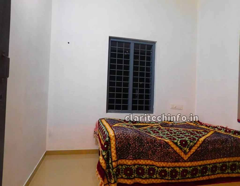 bedroom of 20 lakh home design in kerala